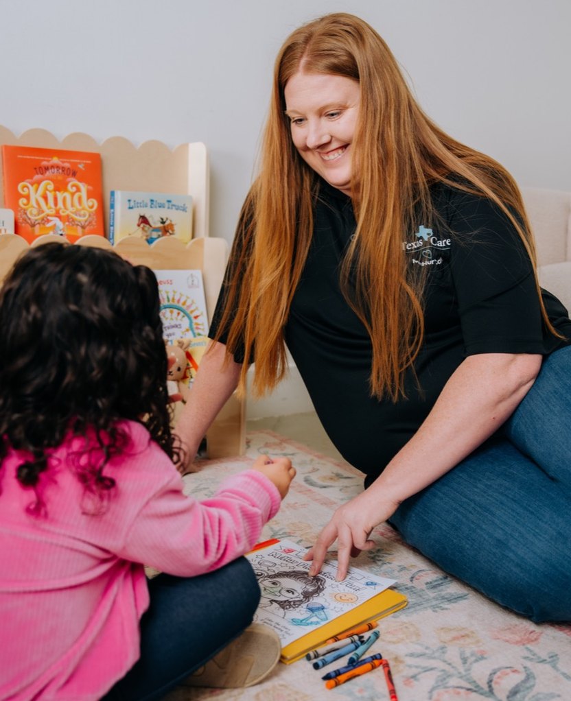 A McHur Care specialist playing a learning game with a child